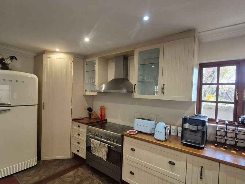 A Country-Style Family Haven with Separate Cottage in the Heart of Douglasdale - Photo 3