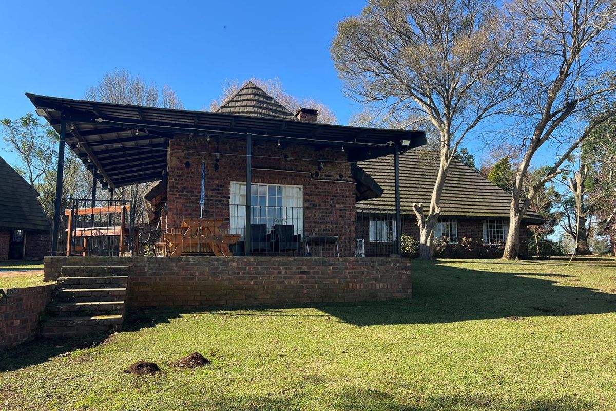 Spacious Country Home with Workshop and Spectacular Midmar Dam Views in Tweedie - Photo 2