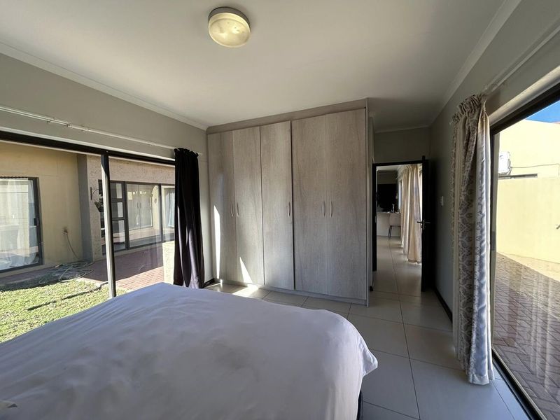 Discover this inviting 3-bedroom unit nestled in a secure gated community, offering comfort and space in a prime location. - Photo 7