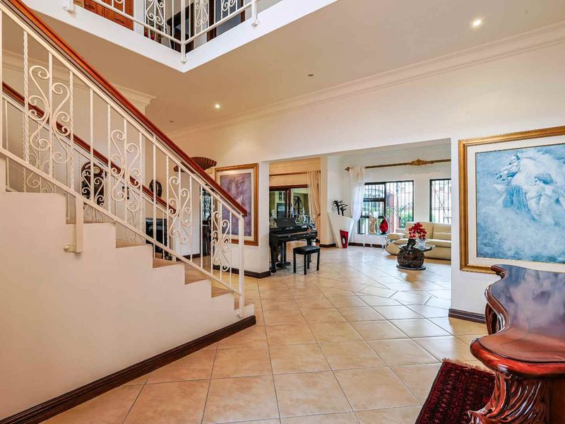 This spacious fully furnished 4-bedroom, 3.5-bathroom home offers comfortable family living with generous entertainment areas and modern conveniences. - Photo 3