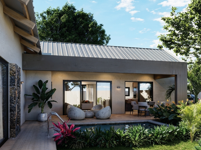 A modern outdoor living space featuring a swimming pool, timber decking, and seamless indoor-outdoor flow through large sliding glass doors.