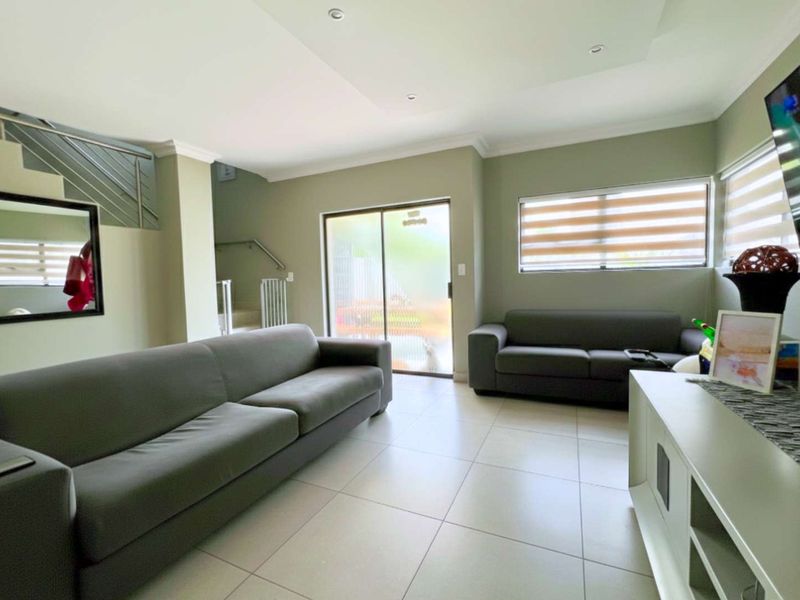 Modern Double-Storey Home in Prestigious Security Estate - Photo 9