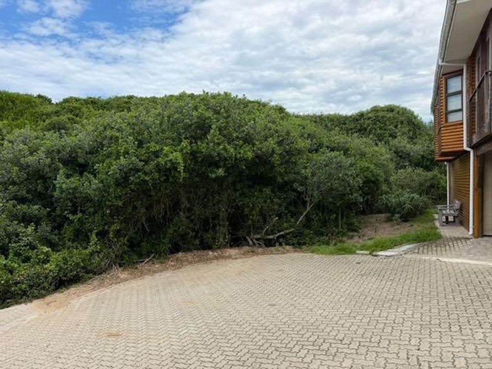vacant land to left of existing property