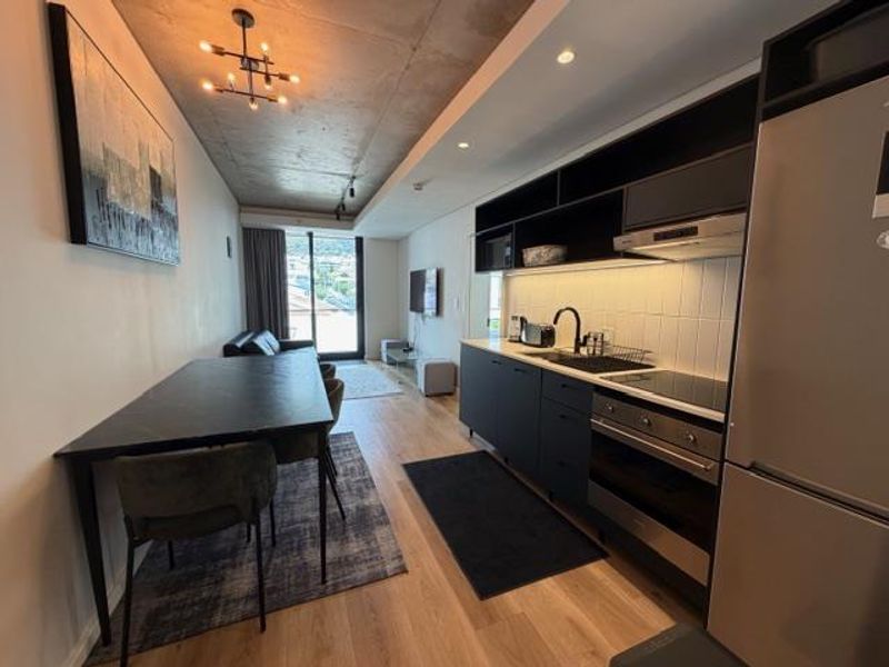 **Experience Modern Luxury Living at Station House** - Photo 6