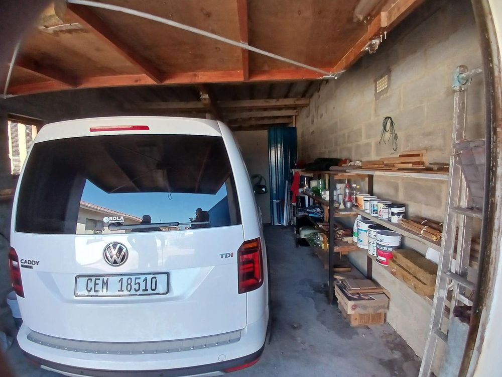 Our Garage (a little bigger than the usual Garage). Accessing Work Place (at the back).