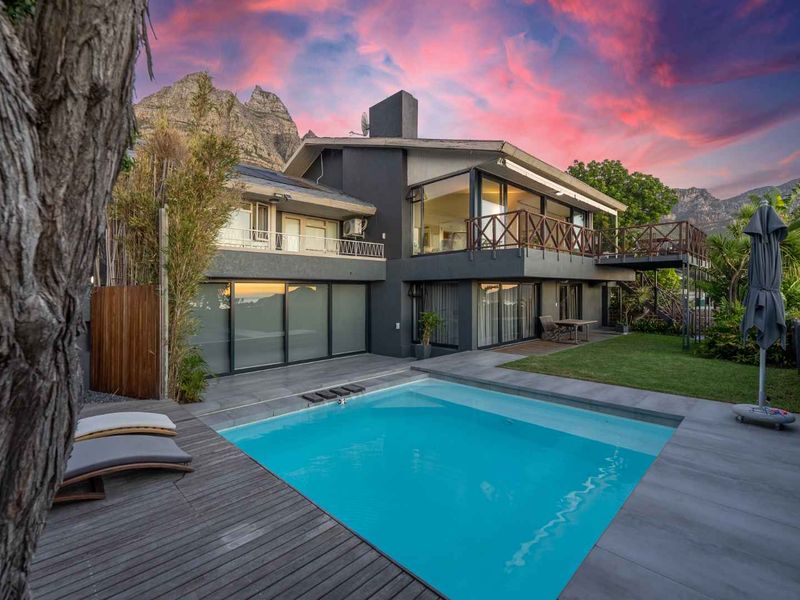 Spacious Family Home with Sea & Mountain Views in a Quite Camps Bay Cul-De-Sac - Photo 7