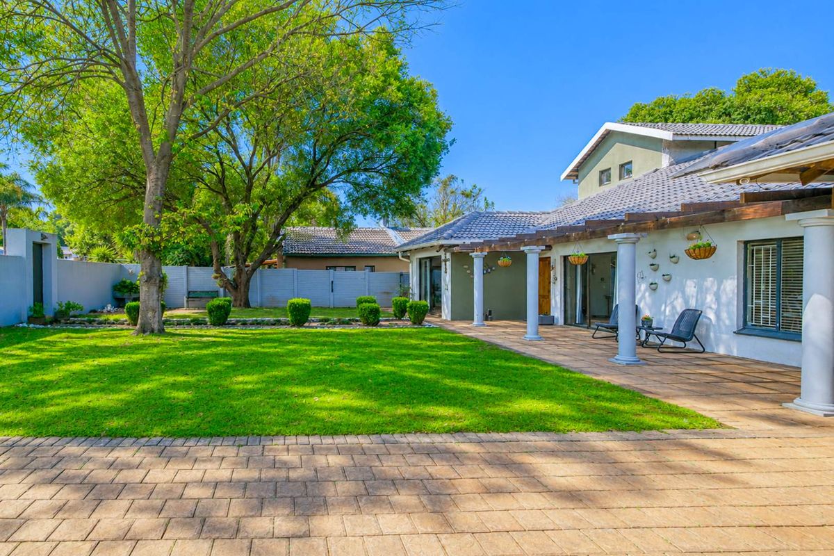 Warm & Inviting 4-Bedroom Home with Modern Amenities Included - Photo 2