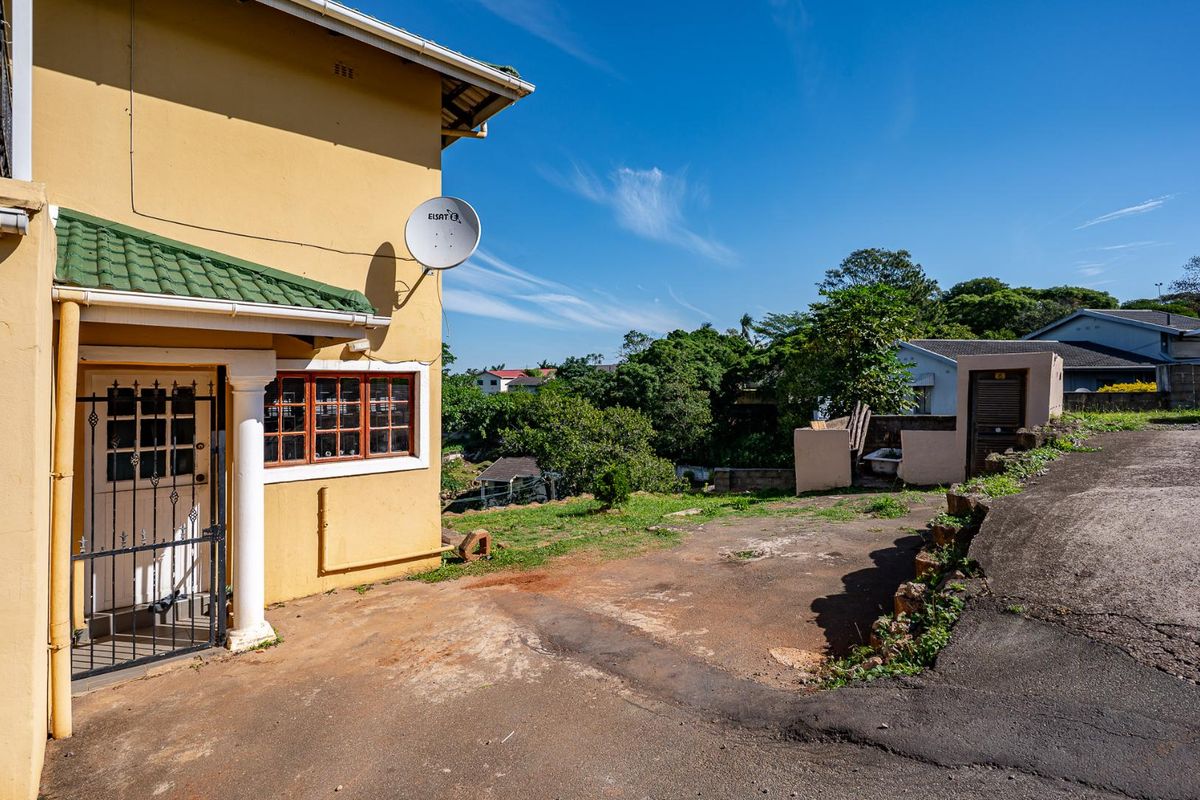 Spacious Hillside Townhouse with Scenic Views & Great Potential - Photo 5