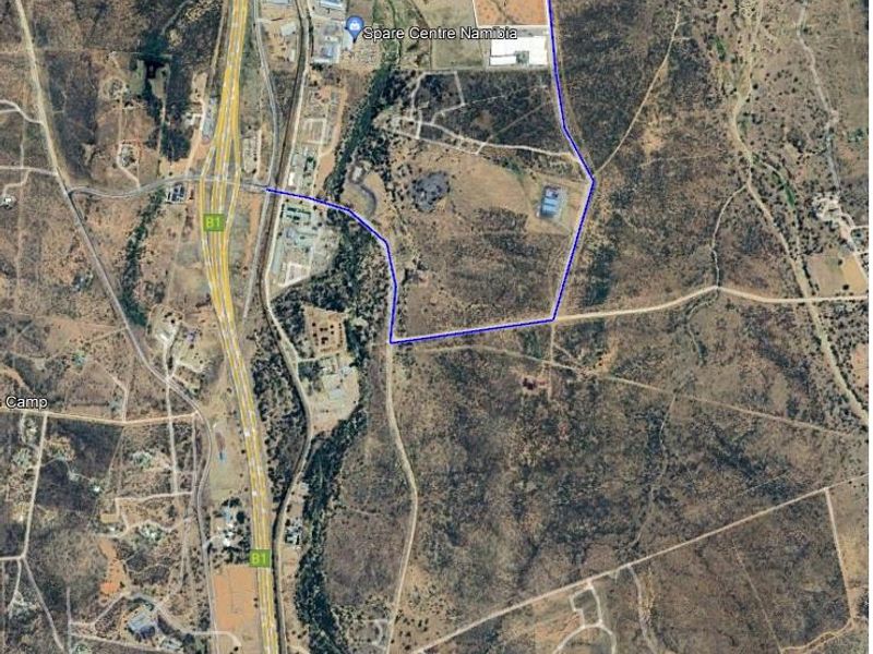 Aerial satellite view showing the industrial property site, including the 18,000m2 platform and 500kVA transformer location.