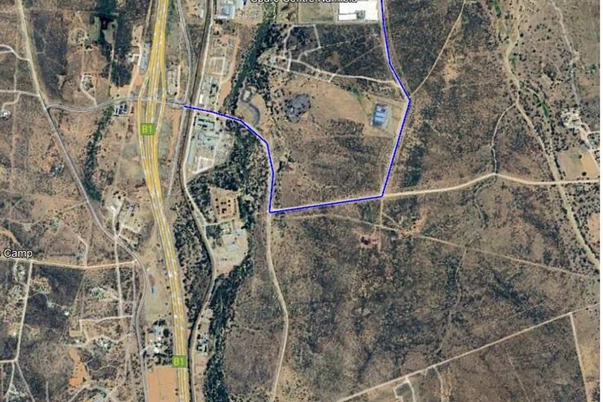 Aerial satellite view showing the industrial property site, including the 18,000m2 platform and 500kVA transformer location.