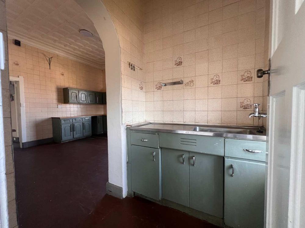 Entrance to kitchen with scullery area