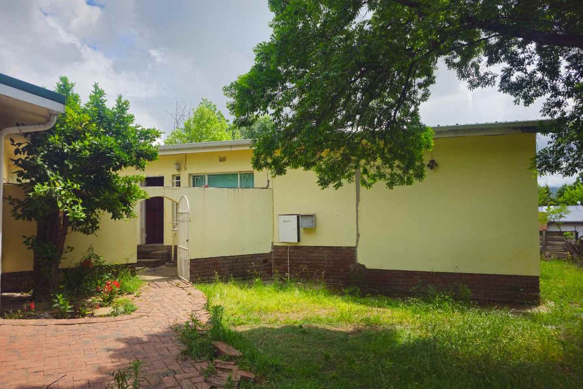 **Spacious 4-Bedroom Property with Immense Potential** - Photo 2