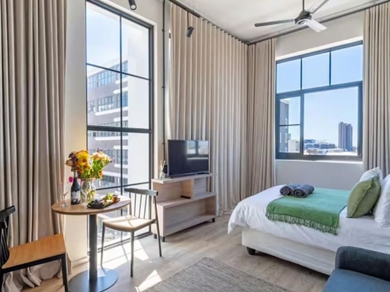 97% Airbnb Occupancy | Fully Furnished | Prime Zonnebloem Investment - Photo 2