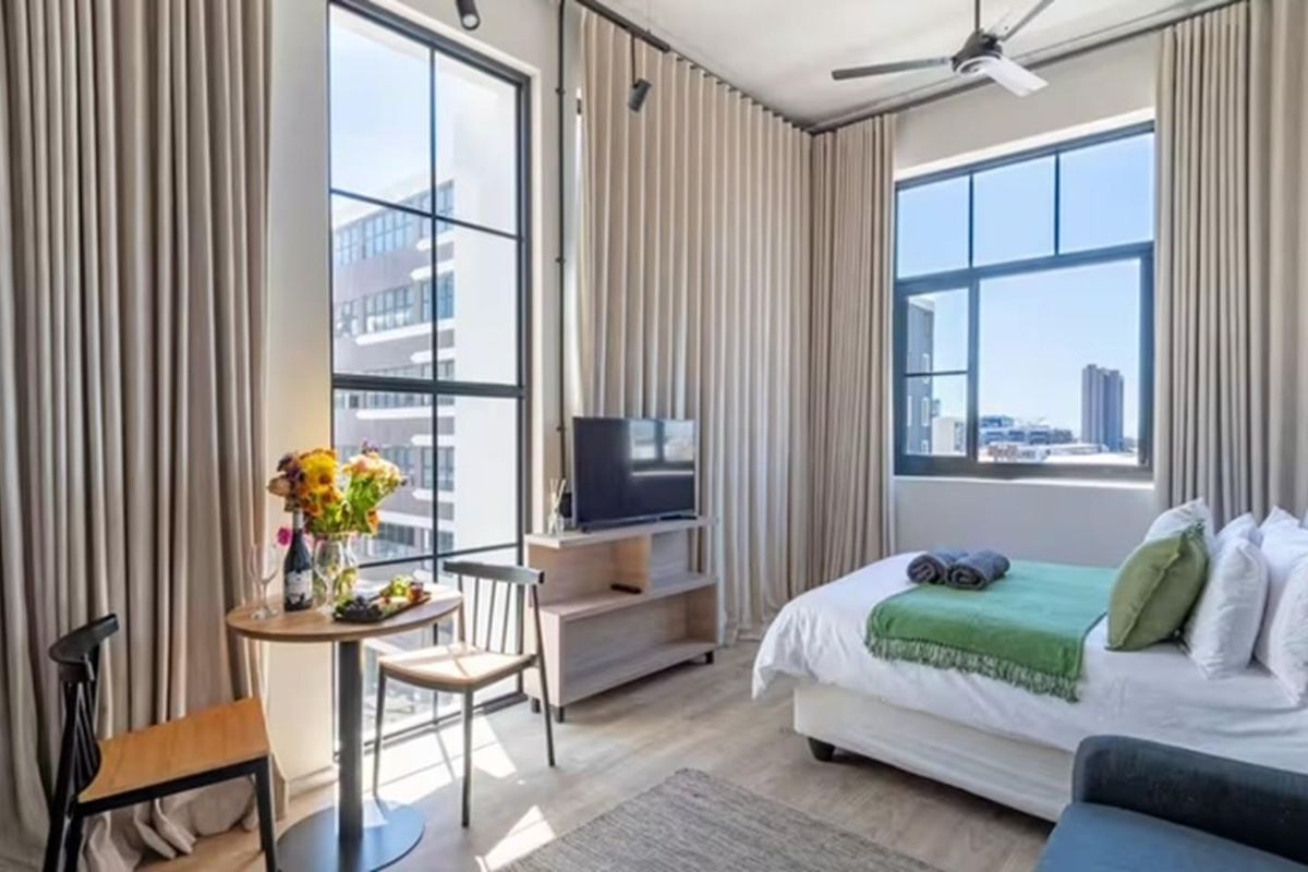 97% Airbnb Occupancy | Fully Furnished | Prime Zonnebloem Investment - Photo 2