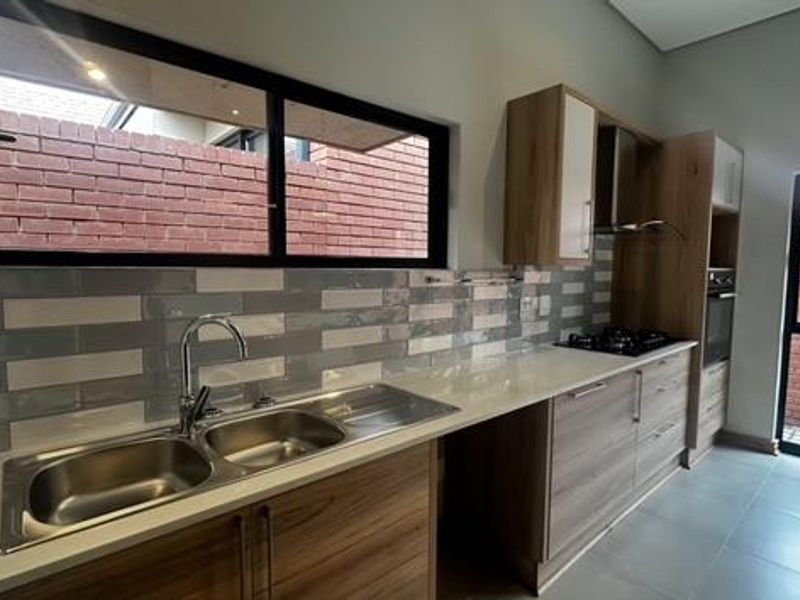 Elegant & Secure Retirement Living in Wild Olive Estate - Photo 5