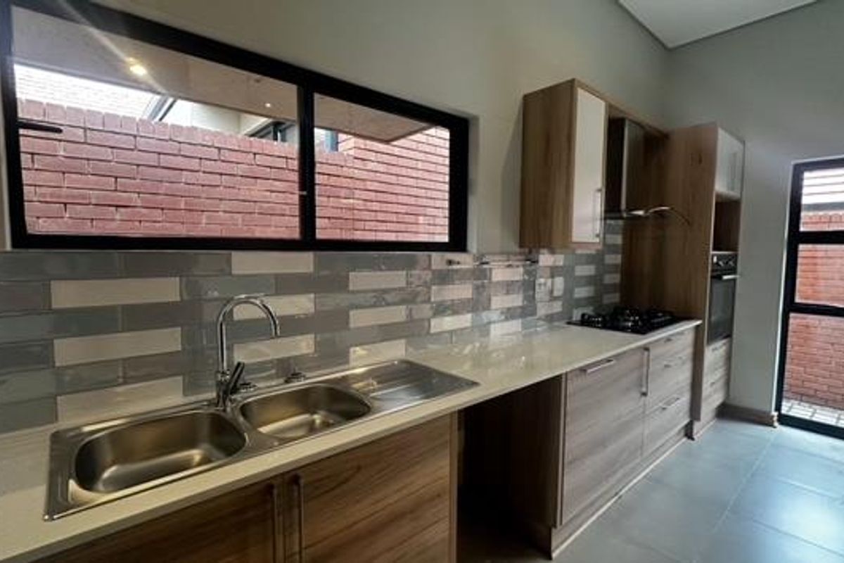 Elegant & Secure Retirement Living in Wild Olive Estate - Photo 5