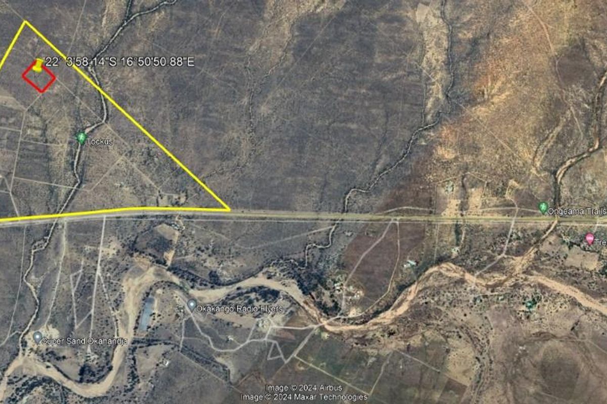 An aerial satellite view showing the geographical location and boundary layout of the property within the surrounding landscape.