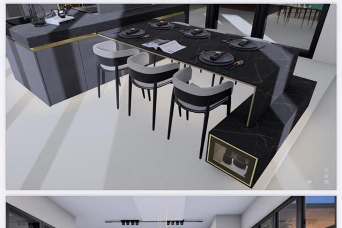 A modern, high-end kitchen featuring a large central island with integrated seating, sleek dark cabinetry, and expansive glass doors opening to the exterior.
