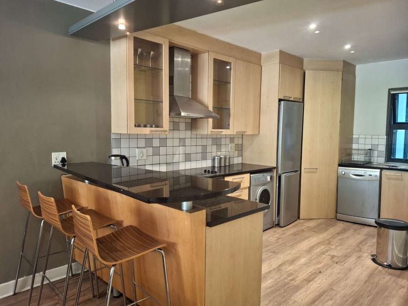 A BEAUTIFULLY FURNISHED TWO BEDROOM APARTMENT - Photo 6