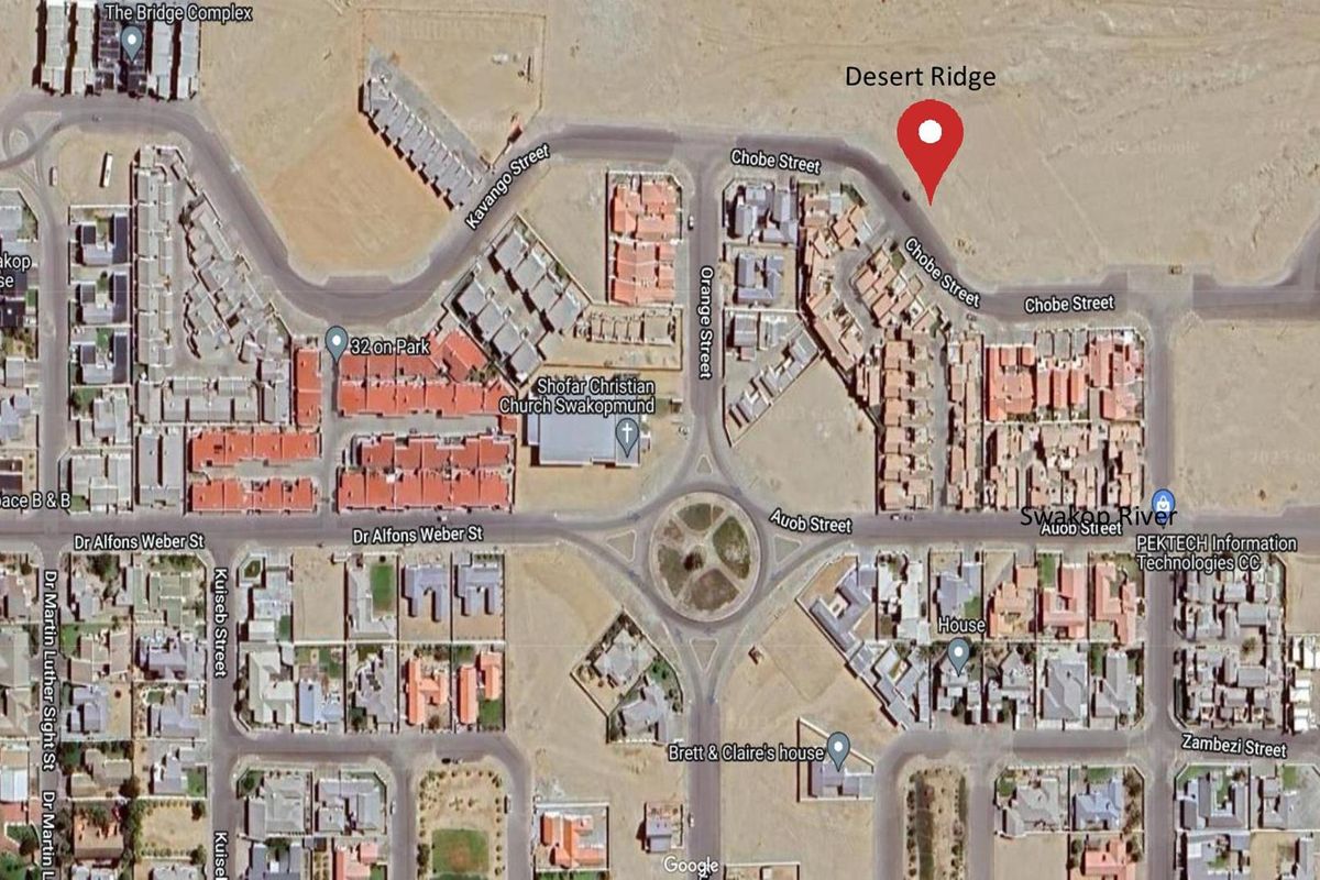 An aerial satellite view showing the location of the Desert Ridge townhouse complex within the surrounding neighborhood street layout.