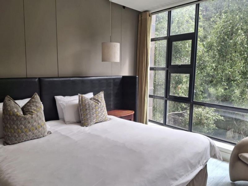 A BEAUTIFULLY FURNISHED TWO BEDROOM APARTMENT - Photo 2