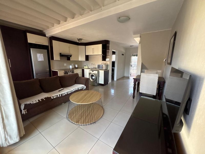 A STUNNING ONE BEDROOM FURNISHED DUPLEX - Photo 6