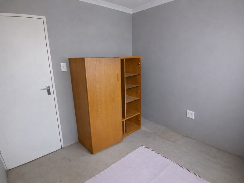 Charming 3-Bedroom Home in a Tranquil Estate - Photo 8