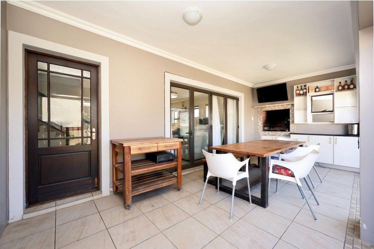 Charming Double-Storey Family Home in a Secure Lifestyle Estate - Photo 4