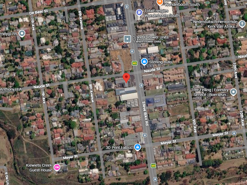 An aerial satellite view showing the urban location and surrounding street network of the property.