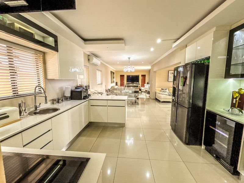 Stunning Family Home with Pool and Outdoor Entertaining - Photo 4