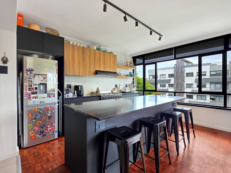 North east facing corner apartment with two balconies and automated garage | Sea Point - Photo 4
