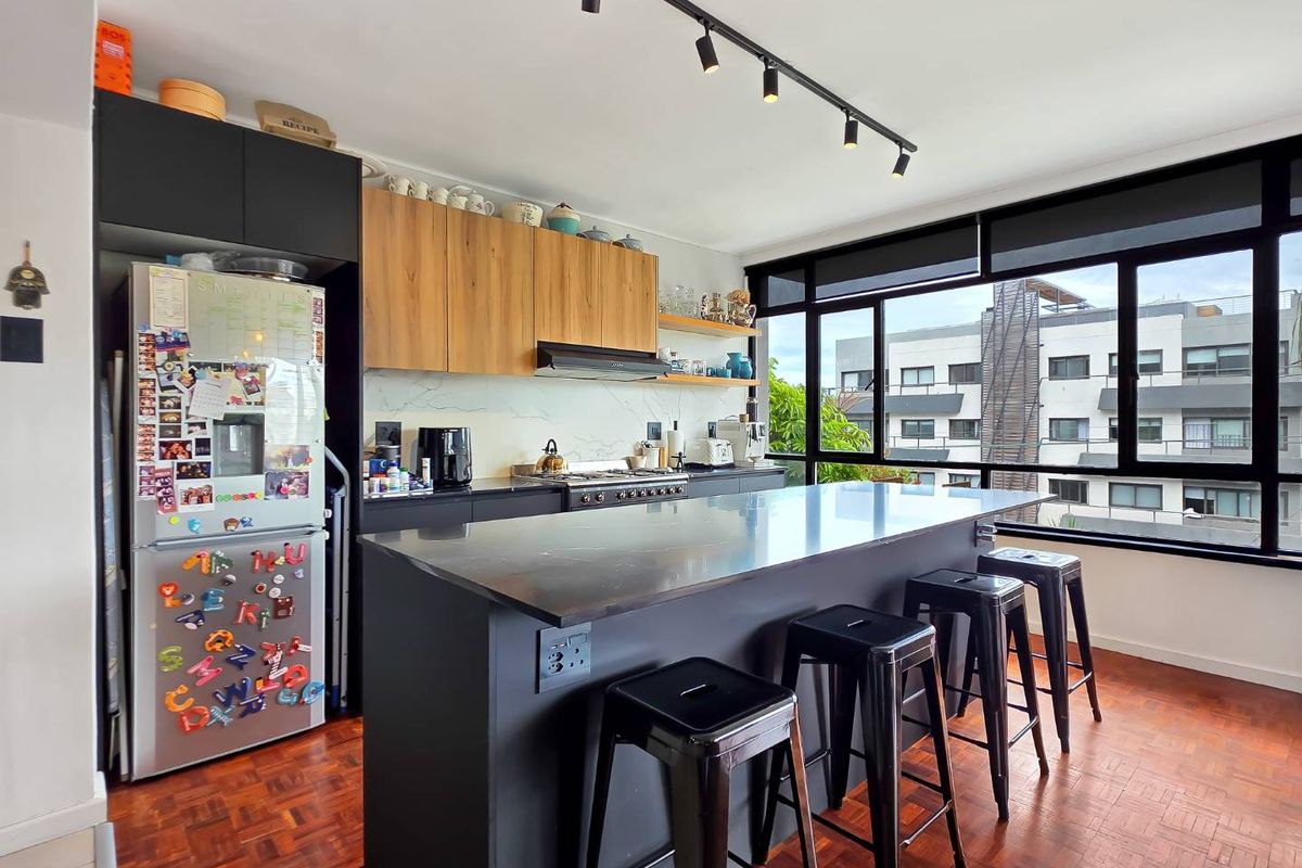 North east facing corner apartment with two balconies and automated garage | Sea Point - Photo 4