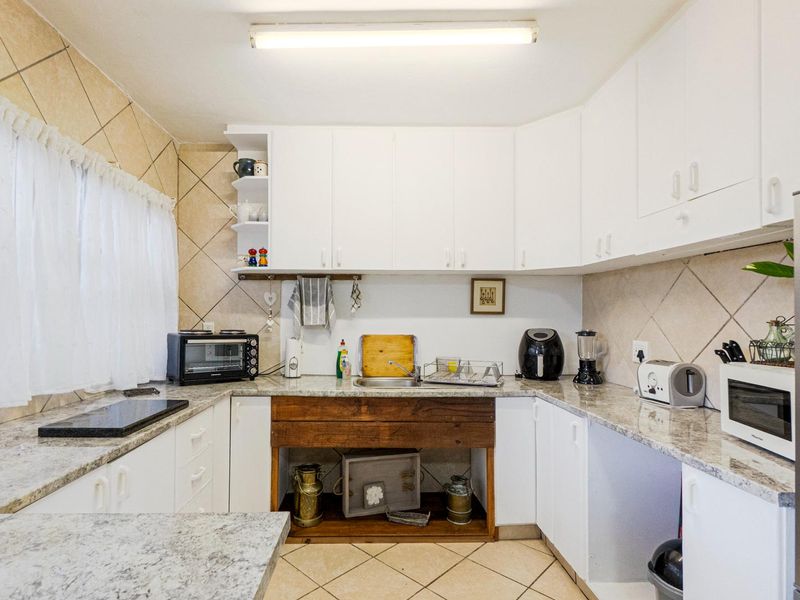 Spacious home with income generating cottage - Photo 3