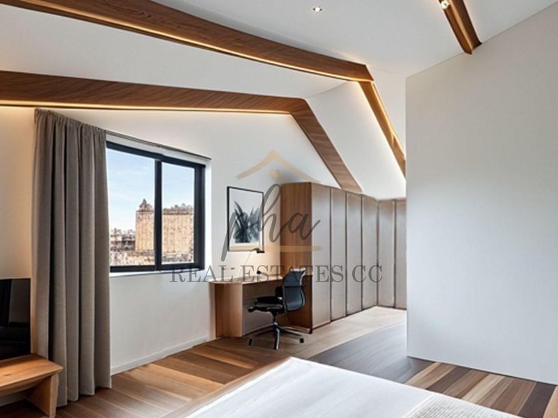 Modern bedroom featuring high-quality hardwood flooring, custom built-in cabinetry, a integrated desk, and architectural timber ceiling beams with recessed lighting.