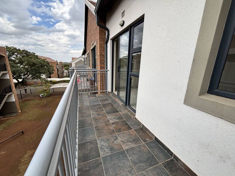 2 Bedroom unit in a secure, well-managed complex. - Photo 5