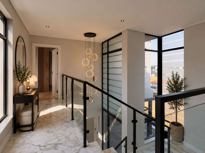 A bright, modern hallway featuring marble flooring, a sleek glass balustrade, and contemporary lighting, overlooking the staircase with large windows.