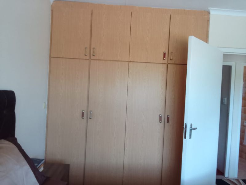 Cozy 3-Bedroom Home with Carport, Satellite Dish, and Comfortable Living Spaces - Photo 10