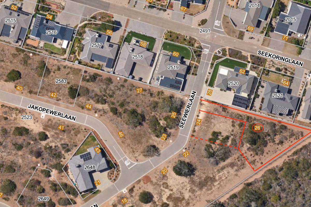 Aerial view of a vacant residential land plot located at the corner of Seewierlaan, showing surrounding neighborhood infrastructure and street access.
