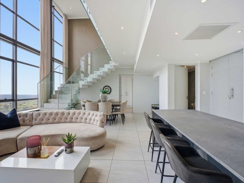 Skyline Elegance: Own a Piece of Sandton's Exclusive Penthouse! - Photo 2