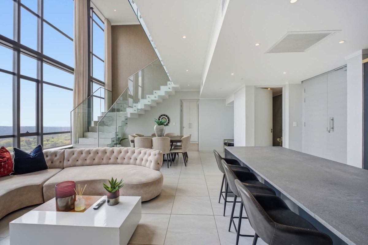 Skyline Elegance: Own a Piece of Sandton's Exclusive Penthouse! - Photo 2