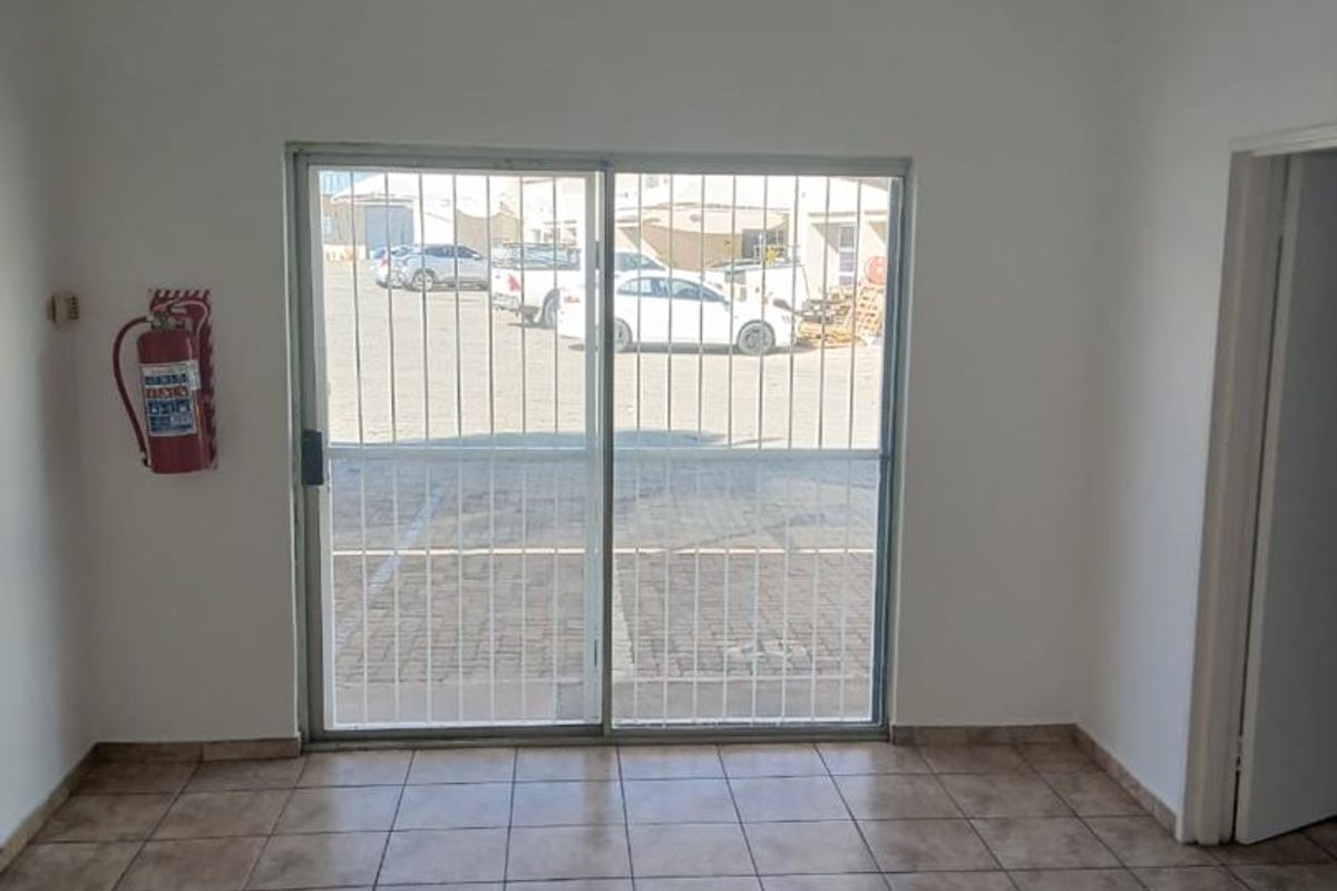 Perfectly Situated in Neat Secure Complex - Photo 2