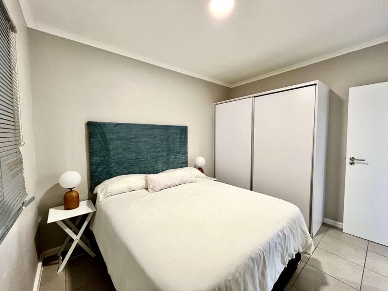 Furnished 2-Bedroom Apartment in Family-Friendly Estate - Photo 7