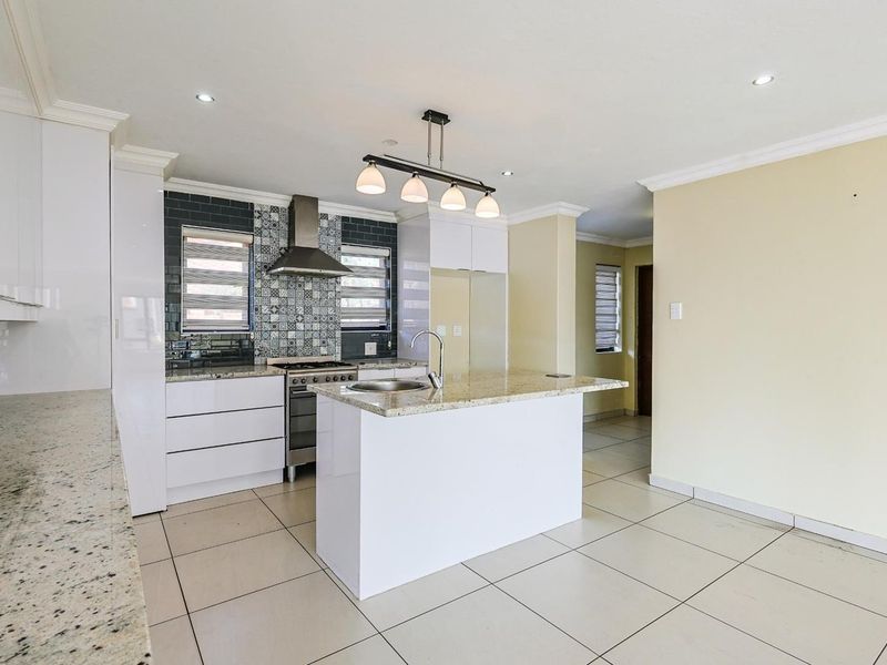 Luxurious Family Living Awaits in a secure estate in the heart of Olympus, Pretoria East - Photo 9