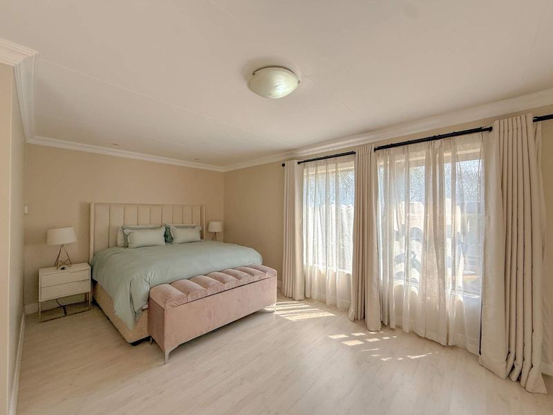 Spacious 4-Bedroom Family Home with Pool, Entertainment Areas & Solar Backup in Highveld - Photo 9