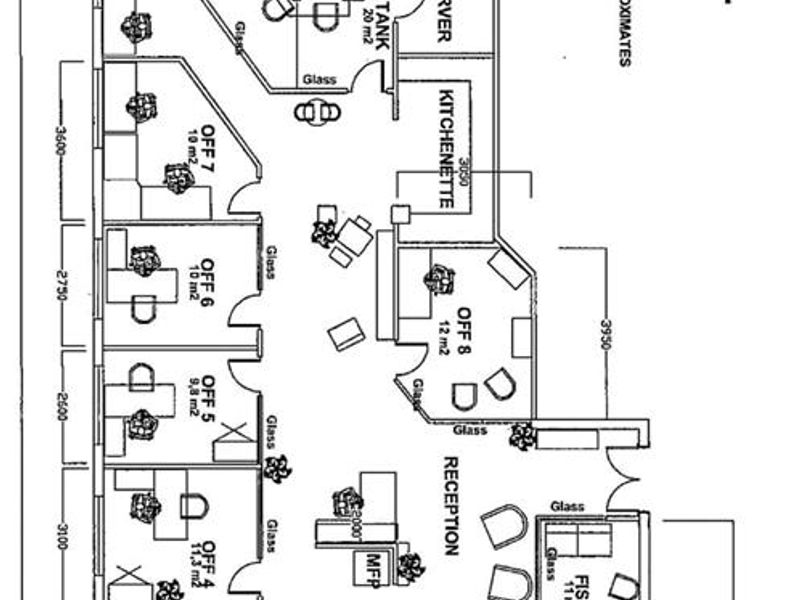A detailed floor plan layout of a commercial office space featuring multiple individual offices, a reception area, kitchenette, and meeting rooms.