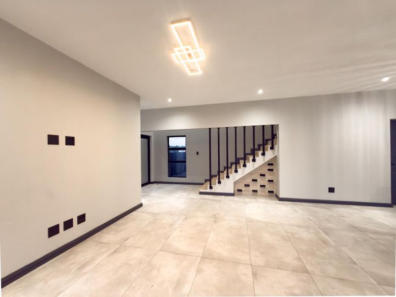 Overview  This modern double-storey home offers the perfect combination of style, privacy, and functional family living.  Designed with comfort - Photo 10