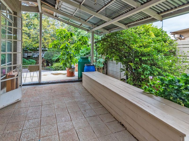 Beautifully Landscaped Garden with Covered Patio Retreat - Photo 9