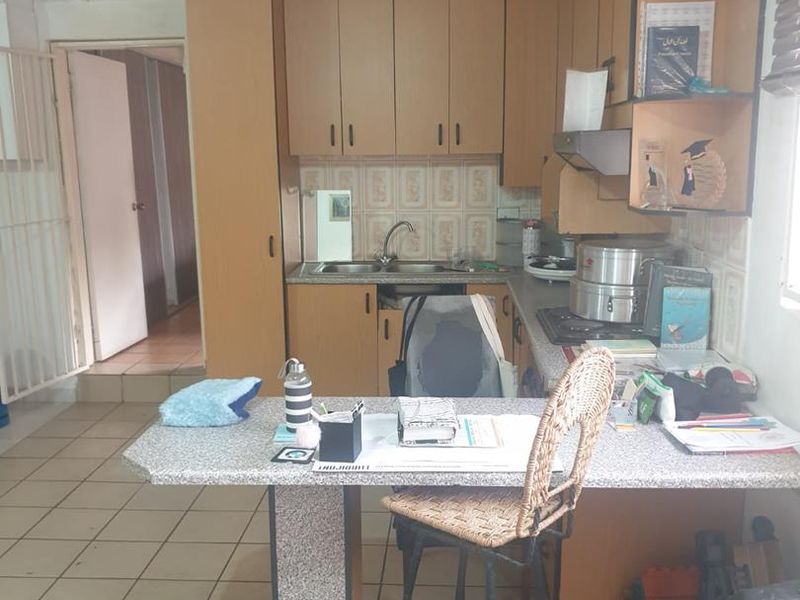 Opportunity Awaits: Spacious 3-Bedroom Home with Private 1-Bedroom Flatlet in Secure Dewald Hattingh Park, Benoni - Photo 5