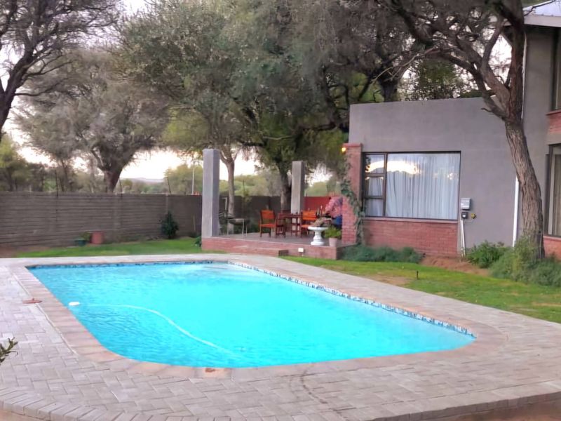 This property is perfect for a family looking for a spacious & modern home in a serene environment! - Photo 3