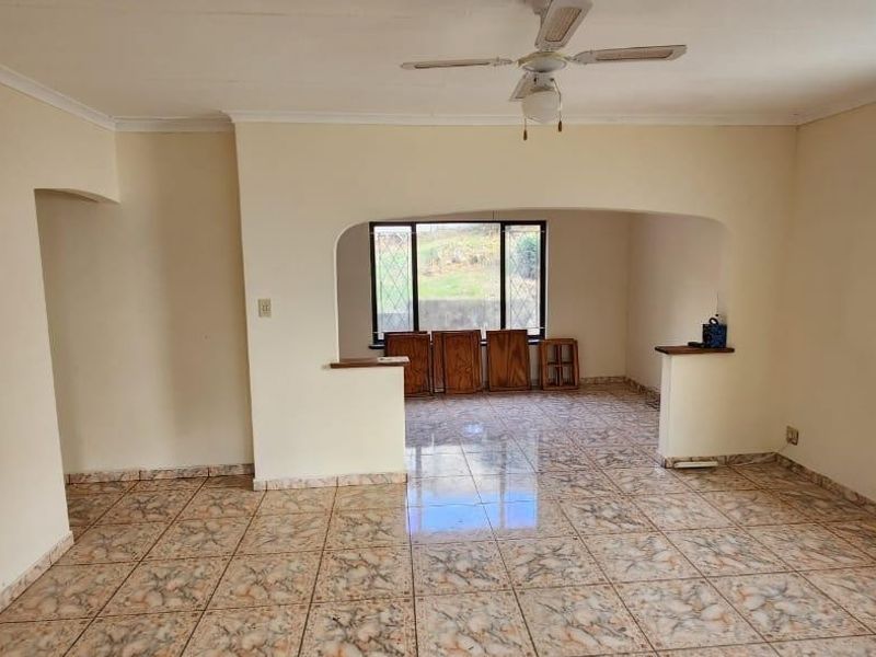 Your New Family Home Awaits in Sunny Hillary - Photo 4